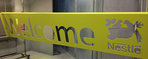 Powder coated Nestle welcome sign